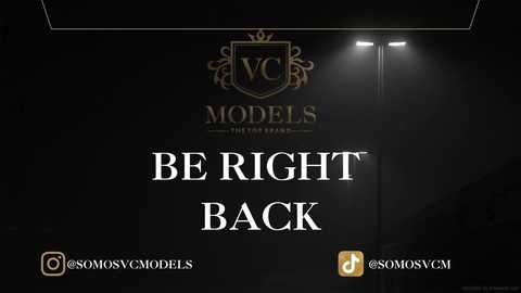 Media: A digital advertisement for \"VCC Models The Showroom\" with a dark background. The text \"BE RIGHT BACK\" is prominently displayed in white. Logo and social media icons are present.