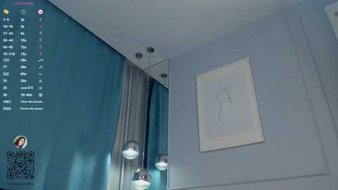 Media: Video of a minimalist room with pale blue walls, featuring a large, abstract painting, three pendant lights, and a calendar displaying the month of June.