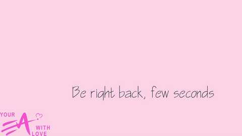 Media: A digital image with a pink background features a handwritten message in black ink: \"Be right back, few seconds.\" The bottom left corner has a logo with the letters \"A\" and \"T\" in pink, and text that reads \"Your A with Love.\