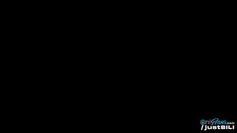 Media: A minimalist, black-and-white digital image with a dark background and a small, light-colored text logo in the bottom right corner. The logo includes the words \"OnlyFans.com\" and \"lustibill\" in a playful, cursive font.