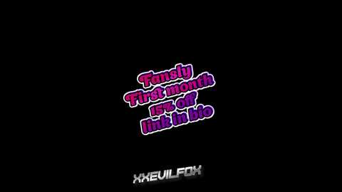 Media: Video of a black screen with bold, colorful text in the center reading, \"Family First Month and in Love,\" in purple and pink letters. Below, \"XEVILFOX\" is displayed in white, bold font.