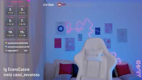 Media: Video of a white gaming chair with a pink heart-shaped neon light in a cozy room with purple curtains, a pink sofa, and colorful posters on the wall.