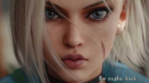 Media: A close-up CGI image of a young woman with fair skin, blue eyes, and platinum blonde hair, displaying a serious expression. She has a slight wound on her cheek. The background is blurred. Text reads, \"Be right back...\