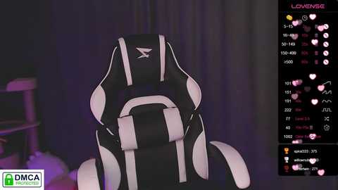 Video of a high-quality gaming chair with black and white accents, featuring a white logo on the headrest. The chair is placed against a dark purple curtain background. To the right, a social media feed with heart icons and comments is visible.