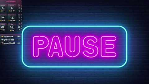 Media: Video of a neon sign with the word \"PAUSE\" in bold, pink letters against a dark brick wall, with a digital clock showing 15:30 in the top left corner.