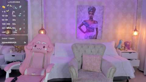 Video of a pink-themed bedroom with a plush chair, white bed, and a framed portrait of Audrey Hepburn; dim lighting, soft textures, and a playful, girly ambiance.