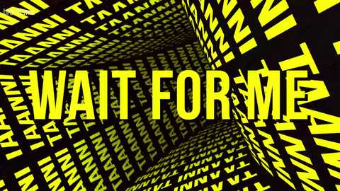 Media: Video of a black and yellow patterned background with the words \"WAIT FOR ME\" prominently displayed in bold yellow letters. The image has a 3D effect, creating a sense of depth and urgency.