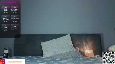 Media: Video of a messy, dimly lit bedroom with a ripped bedsheet, a digital clock displaying 4:50 AM, and a QR code in the bottom right corner.