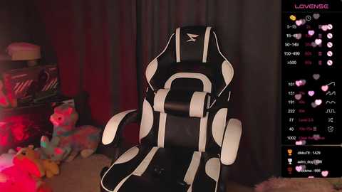 A video of a gamer's setup featuring a black and white gaming chair with a plush toy on the left and a streaming overlay on the right.