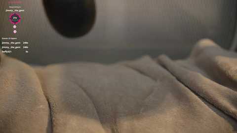 Media: A video of a close-up of a nude woman's abdomen and thighs, with visible skin texture and folds, taken from an overhead angle.