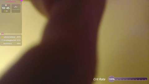 Media: A blurry video of a person's upper body in silhouette, with a yellowish background. Text overlays indicate \"Crim Rate: 100%\" and \"10:55 11:55.\" The image appears to be from a video streaming platform.