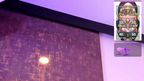 A video of a dimly lit room with a large, textured, brownish-gray wall. The background is purple, and a digital display on the right shows a face with a high heart rate.