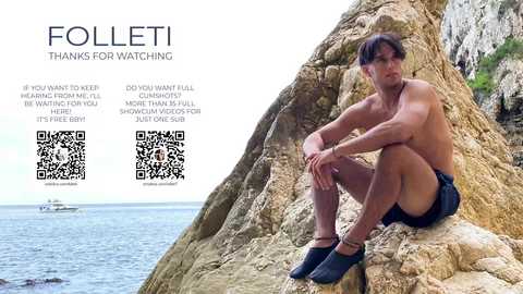 Media: Video of a shirtless, muscular man with short brown hair, sitting on a rocky cliff by the sea. He wears black shorts and sandals. Text: \"FOLLETI THANKS FOR WATCHING.\