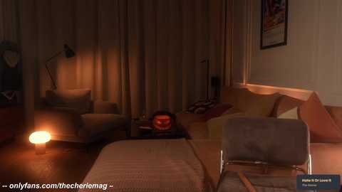 Media: Video of a dimly lit, cozy bedroom with beige curtains, a warm-toned floor lamp, a glowing fireplace, and a chair beside a neatly made bed.