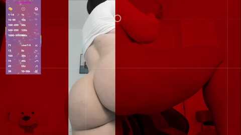 Video of a large, fair-skinned person wearing a white crop top, standing in a bathroom with a red background, showcasing their plump buttocks and visible genital area.