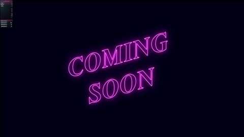 Video of neon sign on a dark background: \"COMING SOON\" in bold, pink letters. The sign's text is slightly curved, creating a dynamic effect. The image is simple and minimalistic, with no other objects or people present.