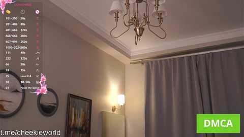 Video of a modern living room with beige walls, gray curtains, and a chandelier. A video feed from twitch.tv/mecheekyworld is overlaid on the image.