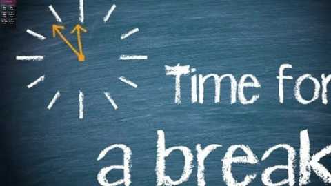 A digital image of a blue chalkboard with white chalk writing: \"Time for a break,\" accompanied by an orange arrow pointing left and a sunburst.