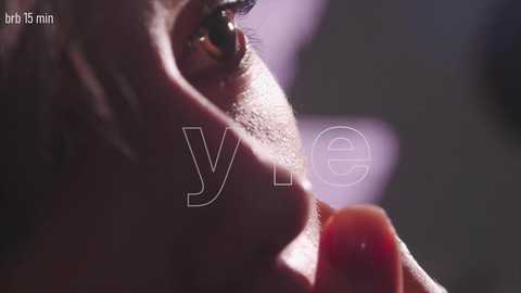 A close-up video of a person's ear, focusing on the eardrum, with the \"Y\" and \"e\" from the URL \"www.yeardrum.com\" overlaid. The background is blurred, emphasizing the ear's intricate details.