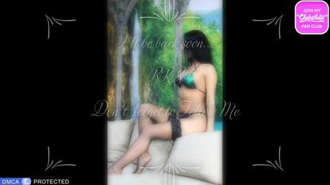 A video of a slender woman with long black hair, wearing a teal bikini and black thigh-high stockings, sitting on a beige couch. The background features lush greenery and a waterfall. Text overlays read \"Don't leave me.\