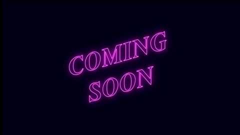 Video of a neon sign against a black background, featuring the words \"COMING SOON\" in bright, glowing pink letters with a slightly fuzzy, vintage aesthetic.