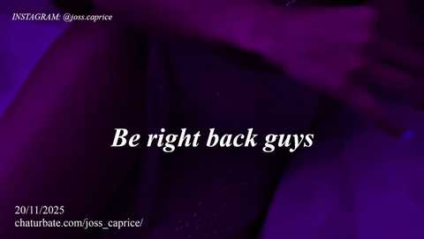 Video of a woman's nude back, with a purple background, featuring text: \"Be right back guys.\" Timestamp: 2011.12.25.