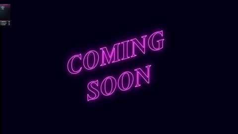 Video of neon sign \"COMING SOON\" in bright pink, glowing against a black background. The text is slightly tilted, with a futuristic, glowing effect. The background is dark, making the sign stand out prominently.