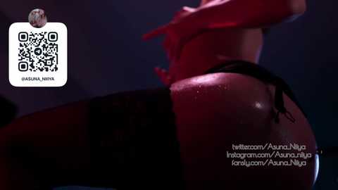 Video of a woman in a red bikini, wet, with a QR code for \"HADIAH NUT\" and watermark \"AuraNymphe\" in the bottom right.