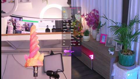 A side-by-side comparison of a modern office desk with a potted plant and a bright pink flower, and a cozy living room with a spiral lamp, potted plants, and a framed photo on a wooden table.