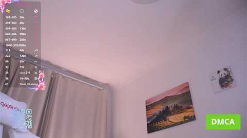 A video of a beige-walled bedroom with a digital overlay displaying a live stream from a webcam. The room features a large framed landscape painting and a small white panda figurine.