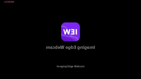 A digital image with a black background featuring the Windows logo in purple with white text \"Windows 11\" and \"Imaging Edge Webcam\" below.