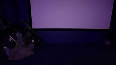 Video of a dimly lit room with a large, blank white projection screen on the wall. In the foreground, there are disorganized audiovisual cables and a partially open laptop bag.