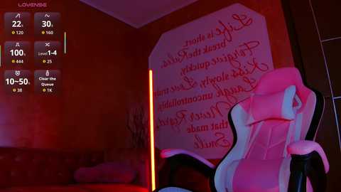Video of a gaming setup with a neon-lit gaming chair and a large, red text banner on a wall.