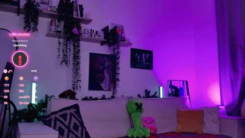 A video of a dimly lit, cozy living room with purple lighting, featuring a white couch, green plush toys, and a Minecraft character avatar screen on a wall.