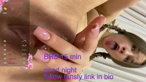 Media: Video of a nude woman with light skin and long brown hair, wearing a pink bikini top. She is smiling and sticking out her tongue. Text overlay reads \"epic right good night follow finally link in bio.\