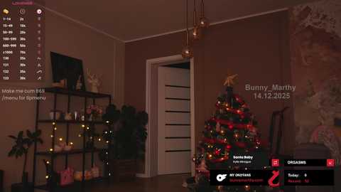 Video of a cozy living room decked out for Christmas, featuring a lit tree, warm lighting, and holiday decor.