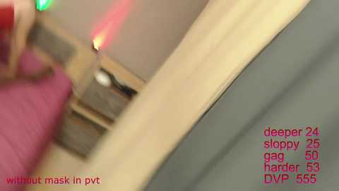 Media: Video showing a close-up of a pink hand holding a wooden paddle with a paddle mask, blurred background, and text overlay reading \"w/ mask in pvt.\