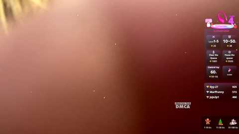 A video shows a close-up of a red, slightly blurred object with a few tiny white specks, possibly bacteria, against a dark background. The image also displays a digital display with a countdown timer and various icons.