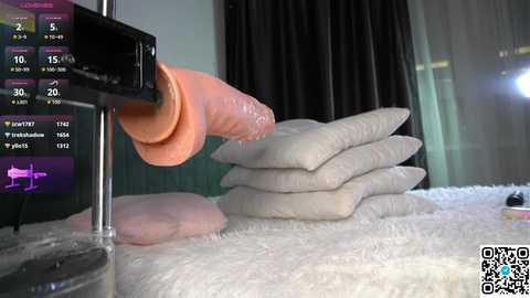 A video shows a realistic, detailed, erect, uncircumcised, and veiny penis being inserted into a realistic, detailed, circumcised, veiny, and erect penis in a digital scene.