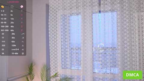 Media: A video of a modern living room with two white patterned curtains, a potted palm, and a digital display showing temperature and humidity readings.