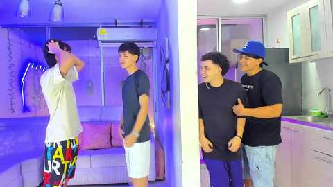 Video collage: Left, man in white shirt, colorful shorts, sweating; right, man in black shirt, blue cap, smiling with two men. Modern kitchen background.