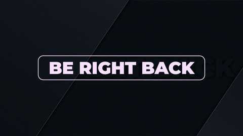 Video of a black car's rear bumper with a white rectangular sticker displaying bold, capitalized, white text reading \"BE RIGHT BACK.\" The background features a dark, textured surface with diagonal lines.