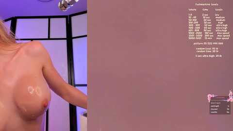 Video of a topless woman with light skin and medium-sized breasts, standing in a purple-lit bathroom with a modern, minimalist design. A stats overlay on the right shows \"Level 7\" and \"Fitness 100%.\