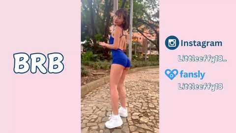 Video of a fit, tan-skinned woman with long brown hair in a blue sports bra and shorts, standing on cobblestones, surrounded by greenery. Text overlay: \"BBR\" and social media icons.