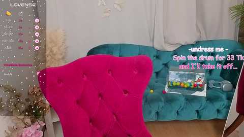 Video of a vibrant pink velvet chair and teal tufted bench in a stylish room with white curtains, flowers, and a digital overlay encouraging weight loss.