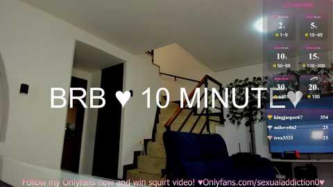 Video of a dimly lit living room with a large TV showing a live stream of a man's face, stairs, and a blue couch. Text overlays read \"10 MINUTE\" and \"OnlyFans\" links.