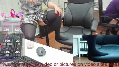 Media: Video collage: top-left: woman in black-and-white checkered dress, black stockings, seated on chair; bottom-left: mouse and keyboard on white desk; bottom-right: black boots on blue chair; top-right: woman wearing black dress, sitting on black office chair; bottom center: text overlay \"View this video or pictures on video sites.\
